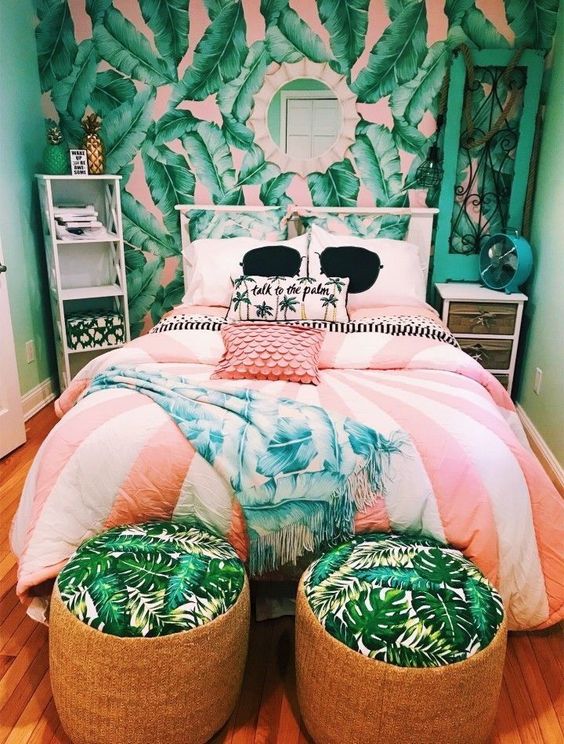Tropical vibe incorprates with soft pink tone making a cozy yet chic bedroom